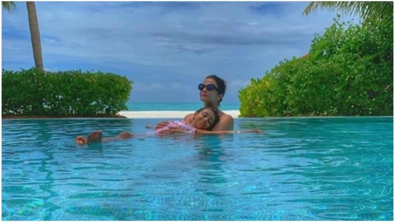 Aishwarya Rai Bachchan and Daughter Aaradhya Ditch the Ocean and Prefer a Dip in the Pool Instead - View Pic
