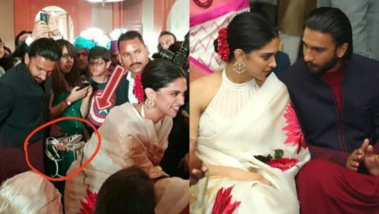 Ranveer Singh holds wife Deepika Padukone's heels at a wedding