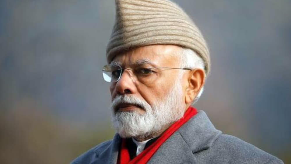 Narendra Modi wearing a winter hat at Dal Lake in Jammu. Narendra Modi wearing a winter hat at Dal Lake in Jammu.