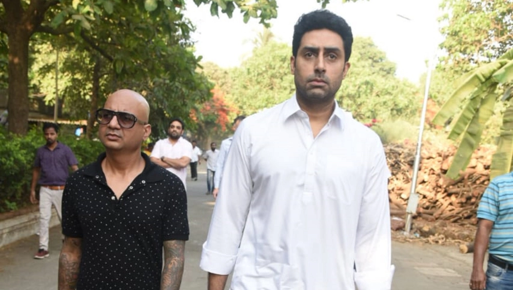 Abhishek Bachchan at Veeru Devgn's funeral.