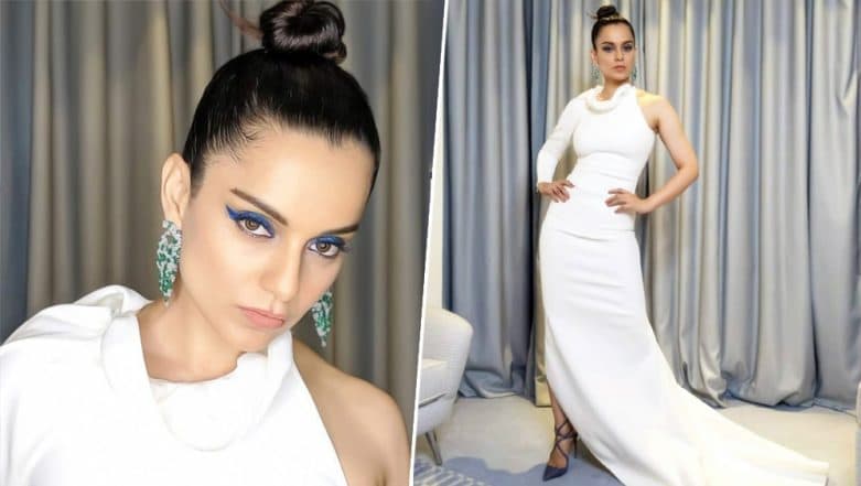 Cannes 2019: Kangana Ranaut Looks Ravishing in a White Single-Sleeved Gown and Blue Winged Eyeliner at the Chopard Party – See Pics Cannes 2019: Kangana Ranaut Looks Ravishing in a White Single-Sleeved Gown and Blue Winged Eyeliner at the Chopard Party – See Pics