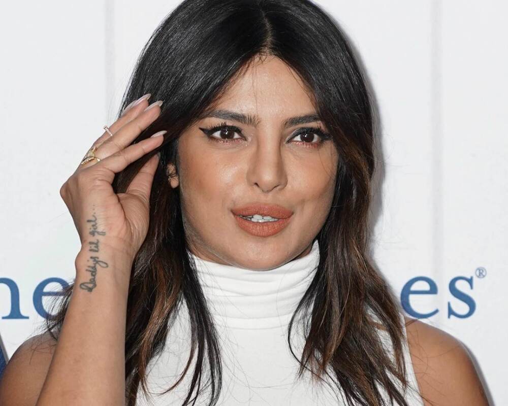 Priyanka Chopra Jonas Makes A Chic Statement In A Striped Midi Skirt Sleeveless Turtleneck And 