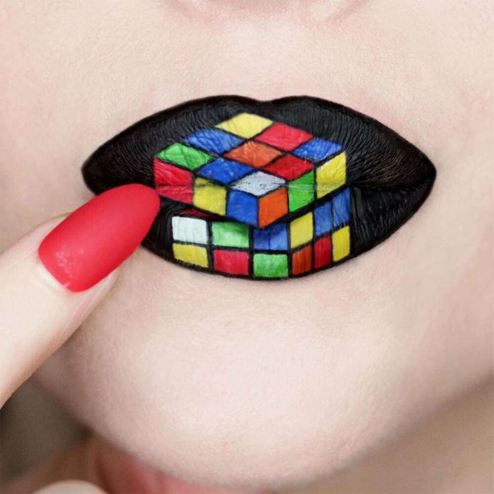 Twisted rubic cube makeup on lips. Twisted rubic cube makeup on lips.
