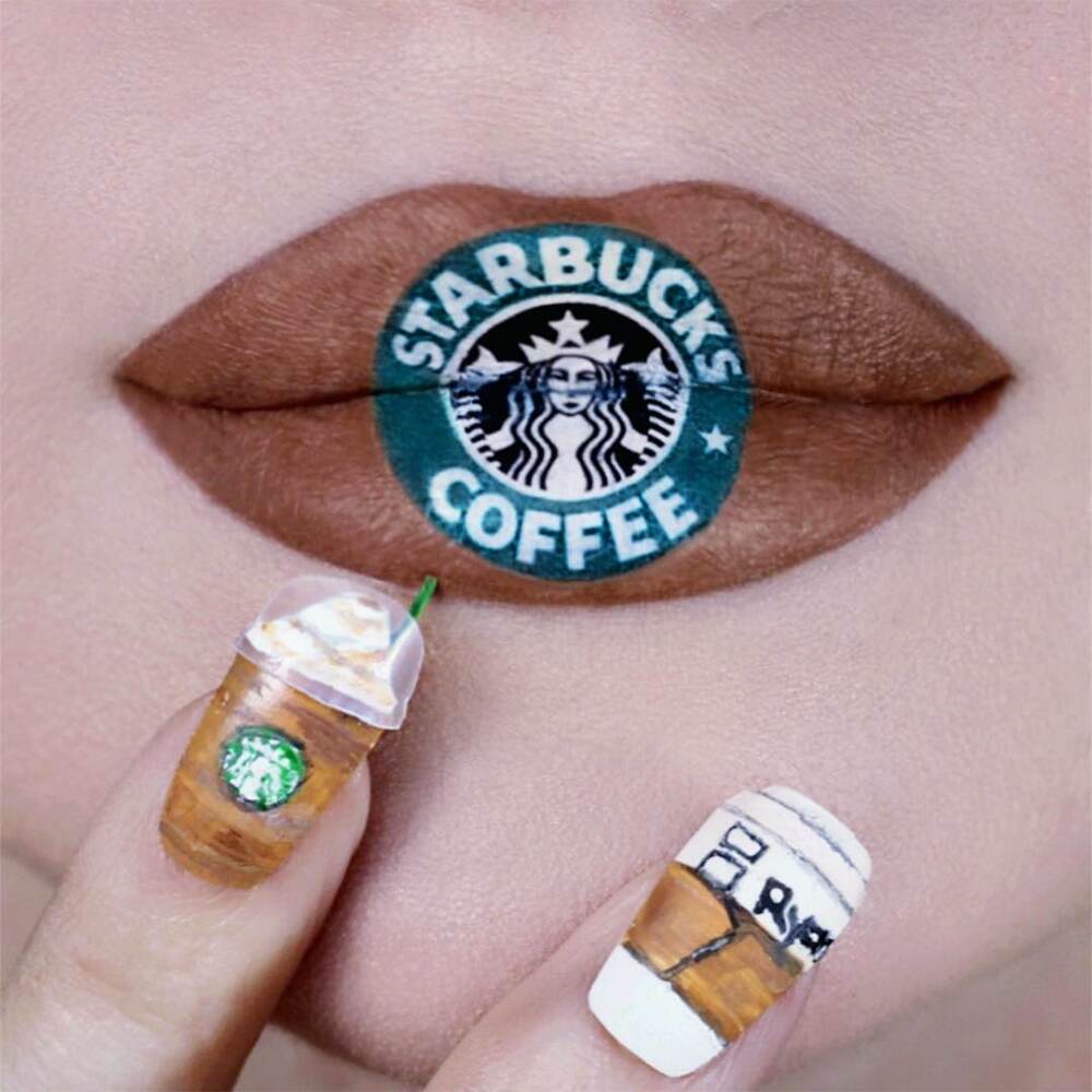 Makeup artist makes Starbucks coffee design on the lips. Makeup artist makes Starbucks coffee design on the lips.