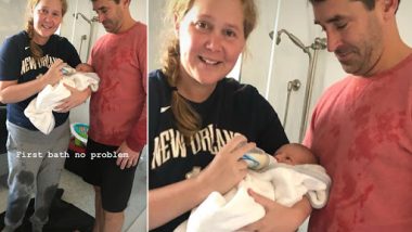 Amy Schumer and Husband Chris Fischer Give Their New Born Son Gene His First Bath