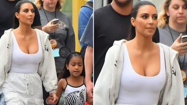 Kim Kardashian Goes Braless in a Nipple-Flashing Tank Top While Enjoying a Day at Disneyland With North West