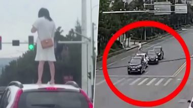 Angry Wife Climbs on Top of Car Roof at Signal in China After Fight With Husband, Watch Viral Video