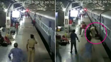 Woman Falls Off Platform While Boarding Moving Train at Ahmedabad Railway Station, RPF Jawan And Bystanders Save Her - Watch Video