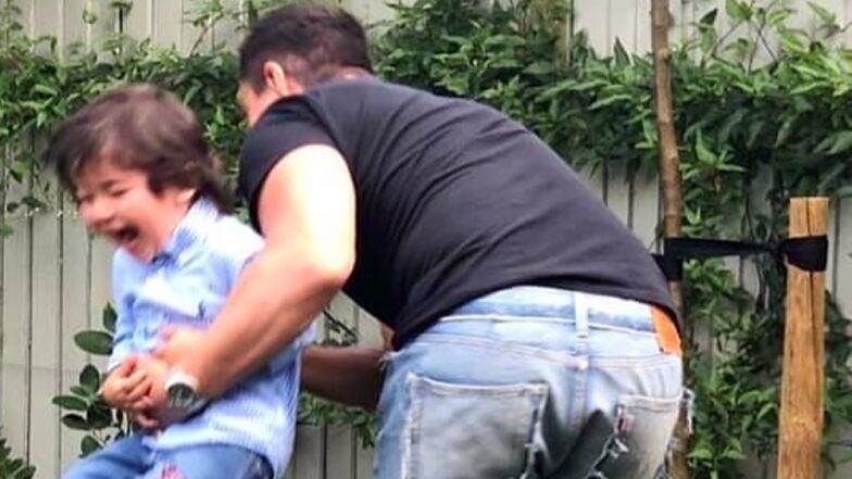 Taimur Ali Khan Laughs His Heart Out as Dad Saif Ali Khan Lifts Him Off the Ground in This Adorable Picture and We Can't Stop Gushing Over It! Taimur Ali Khan Laughs His Heart Out as Dad Saif Ali Khan Lifts Him Off the Ground in This Adorable Picture and We Can't Stop Gushing Over It!