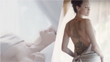 Angelina Jolie Strips Down, Flaunts Tattoos for New Mon Guerlain Campaign Commercial