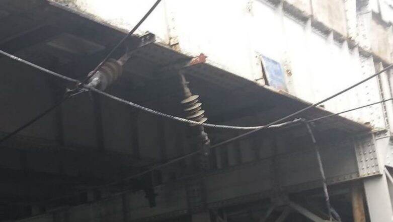 Mumbai Local Trains Disrupted on Western Line After Cable Falls on Over Head Equipment Between Mahalaxmi And Mumbai Central Stations Mumbai Local Trains Disrupted on Western Line After Cable Falls on Over Head Equipment Between Mahalaxmi And Mumbai Central Stations