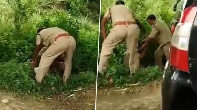 Uttar Pradesh: 2 Cops Exchange Blows in Kanpur Over 'Front Seat' in UP Police Vehicle, Video Goes Viral Uttar Pradesh: 2 Cops Exchange Blows in Kanpur Over 'Front Seat' in UP Police Vehicle, Video Goes Viral