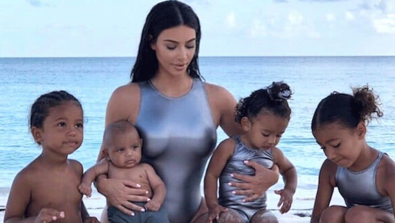 Kim Kardashian Shares First-Ever Photo with All Four Kids Kim Kardashian Shares First-Ever Photo with All Four Kids