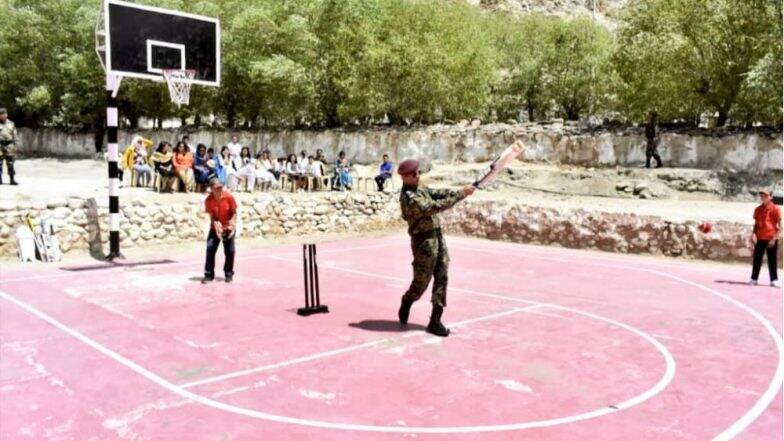 MS Dhoni Plays Cricket with Kids in Leh, Picture Goes Viral MS Dhoni Plays Cricket with Kids in Leh, Picture Goes Viral