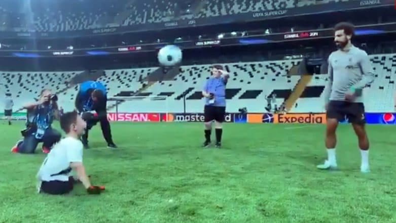 Mohamed Salah Playing With Disabled Football Fan Ahead of Liverpool vs Chelsea, UEFA Super Cup 2019 Final Match Will Warm Your Heart (Watch Video) Mohamed Salah Playing With Disabled Football Fan Ahead of Liverpool vs Chelsea, UEFA Super Cup 2019 Final Match Will Warm Your Heart (Watch Video)