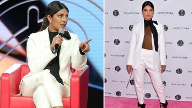 Priyanka Chopra Looks Super Hot in her White Pantsuit with a See Through Black Blouse at BeautyCon LA (View Pics)