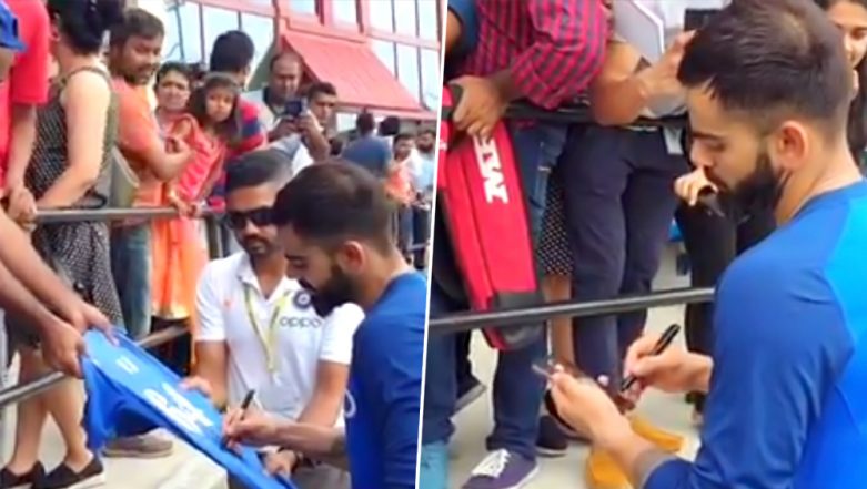 Virat Kohli Smilingly Signs Autographs with Fans Ahead of IND vs WI T20 Series (Watch Video)