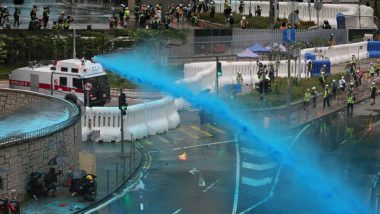 Hong Kong Police Fire Water Cannon, Tear Gas as HK Protesters Mass Outside Parliament