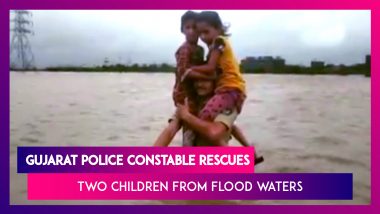 Gujarat Floods: Police Constable Rescues Two Children By Carrying Them On His Shoulders