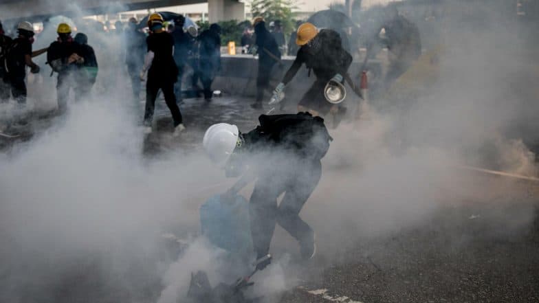 Hong Kong Protests: Police Fire Tear Gas as Clashes Return to City Streets Hong Kong Protests: Police Fire Tear Gas as Clashes Return to City Streets