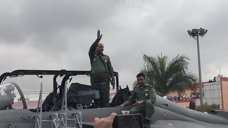 Defence Minister Rajnath Singh Undertakes Maiden Sortie on Tejas LCA in Bengaluru (Watch Video) Defence Minister Rajnath Singh Undertakes Maiden Sortie on Tejas LCA in Bengaluru (Watch Video)
