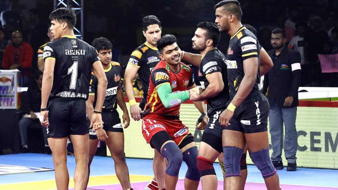 PKL 2019 Match Result: Bengaluru Bulls Ride Pawan Sehrawat Show to Beat Telugu Titans 40-39 PKL 2019 Match Result: Bengaluru Bulls Ride Pawan Sehrawat Show to Beat Telugu Titans 40-39