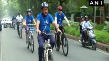 Harsh Vardhan Cycles to WHO Meet, Participates in Yoga Session