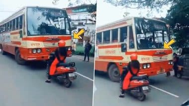 Kerala Woman Blocks Path of Bus Driver Who Comes in Wrong Lane, Forces Him to Take Right Way - Watch Video