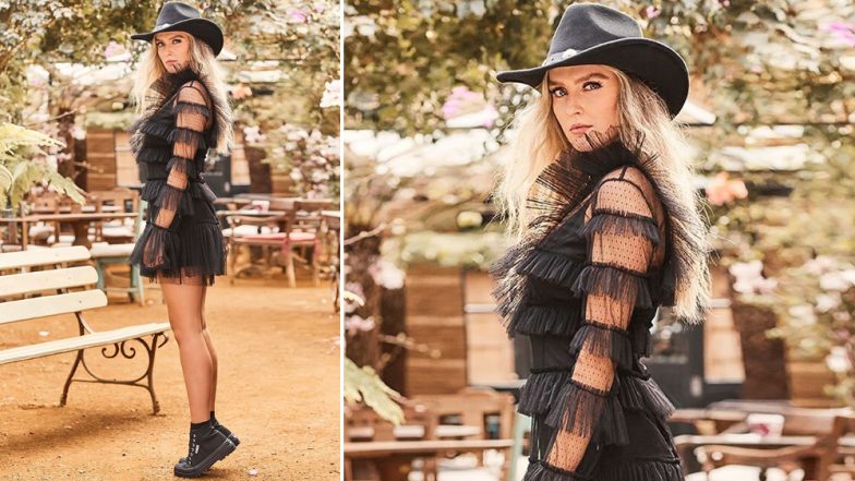 Yo or Hell No! Perrie Edwards Pairs Cowboy Hat with a Little Black Dress for Superga Campaign