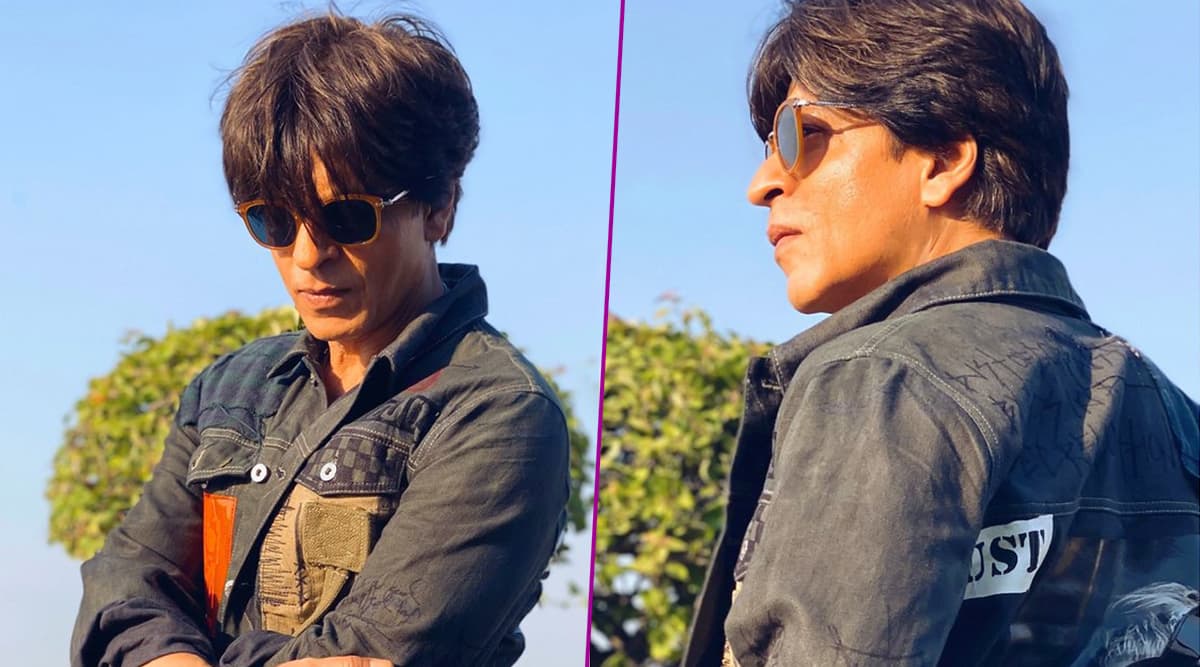 Shah Rukh Khan Shares Pictures Wearing Karan Johar's Dust of Gods Jacket and Fans Can't Get Over His Younger Look, Say He's Reverse-Ageing! (View Pic) Shah Rukh Khan Shares Pictures Wearing Karan Johar's Dust of Gods Jacket and Fans Can't Get Over His Younger Look, Say He's Reverse-Ageing! (View Pic)