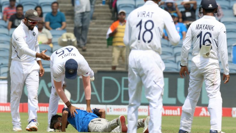 IND vs SA 2nd Test 2019: Man Breaches Security Cordon, Touches Rohit Sharma's Feet Before Being Hauled Off the Field