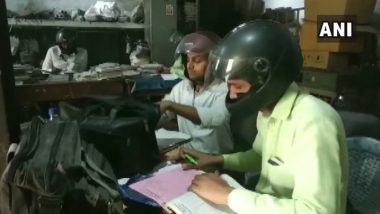 Shocking! Employees of Uttar Pradesh Government Office Wear Helmets While Doing Desk Job, Here's Why