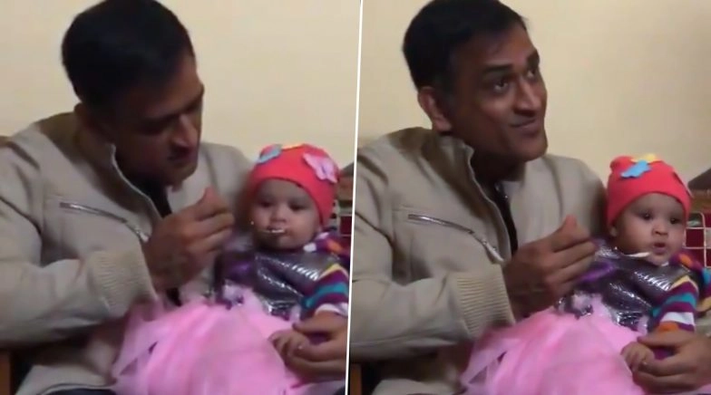 MS Dhoni Feeds a Baby Girl on Her Annaprashana