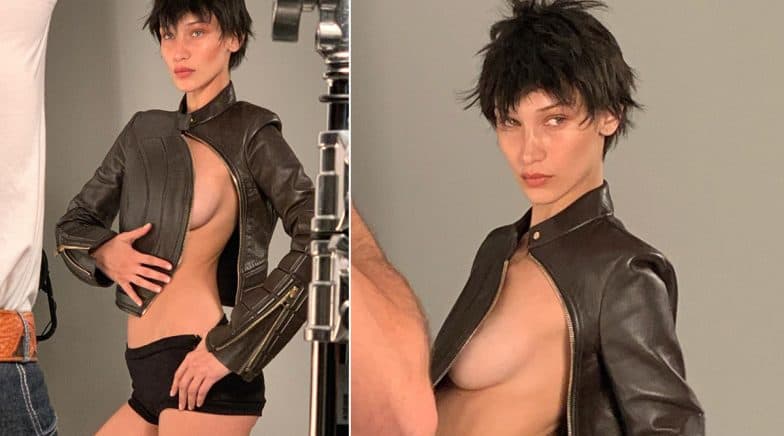 Bella Hadid unzips her jacket for Pop Magazine's photoshoot. 