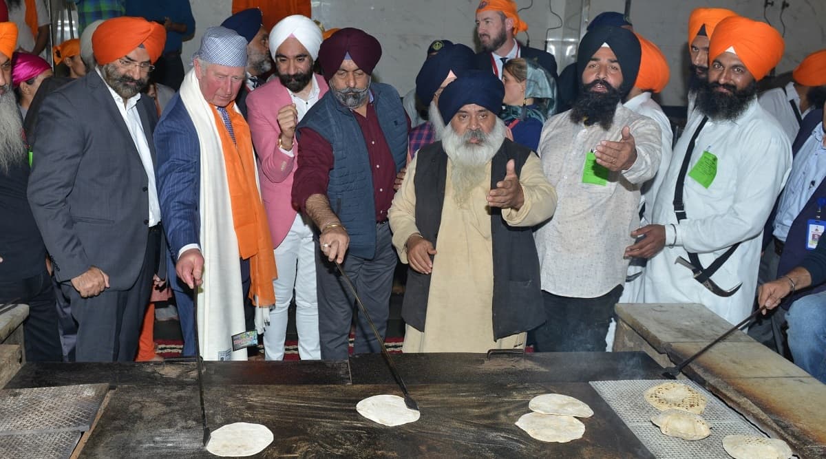 Britain’s Prince Charles Visits Bangla Sahib Gurudwara in Delhi, Tries Flipping ‘Chapati’ Britain’s Prince Charles Visits Bangla Sahib Gurudwara in Delhi, Tries Flipping ‘Chapati’