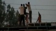 Madhya Pradesh: Man Dangling from Overhead Wire at Dabra Railway Station Rescued by GRP; Watch Video