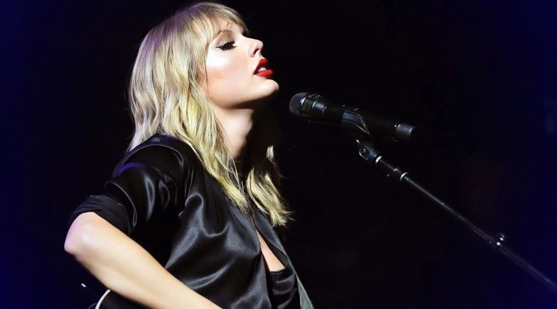 Taylor Swift Is Spending Her Lockdown Days Sipping a Glass of Wine and Listening to Old Music