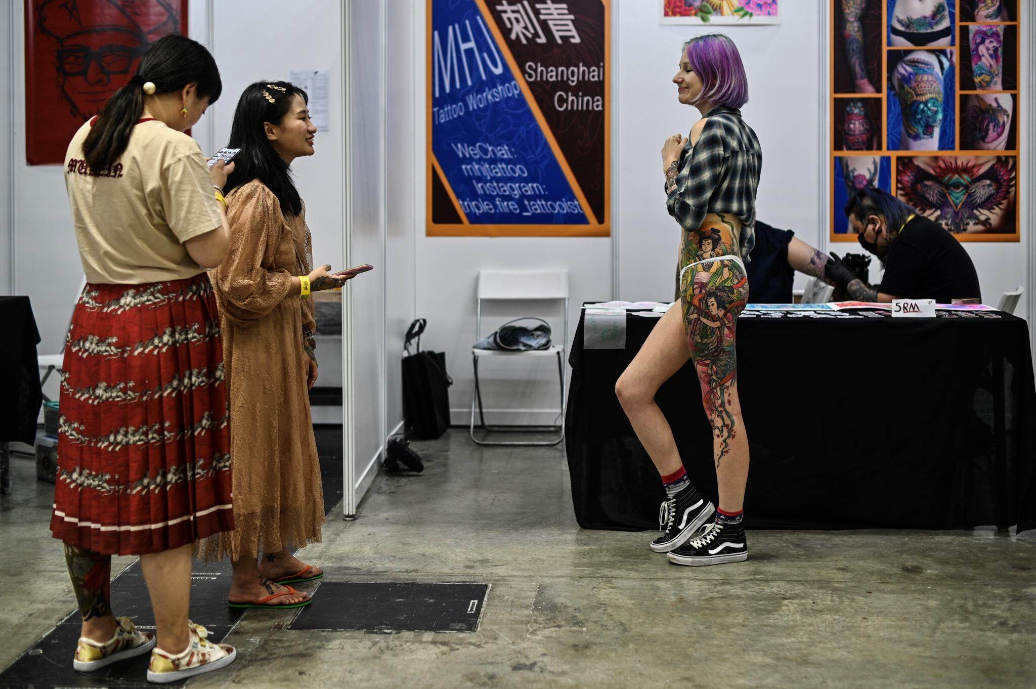 Malaysia Slams Tattoo Expo Over HalfNaked Pics Gets Termed As Porn