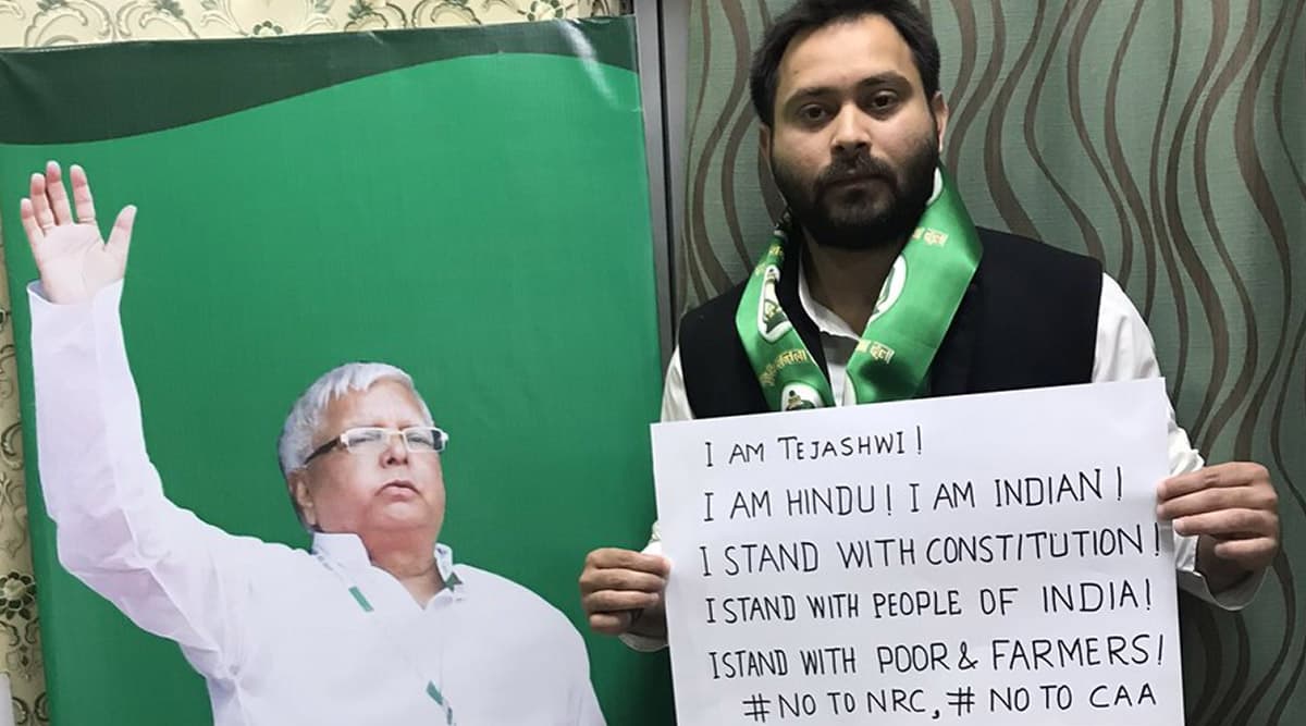 Tejashwi Yadav Joins Anti-CAA Protests, Tweets Picture With Poster Reading 'I am Hindu, I am Indian' Tejashwi Yadav Joins Anti-CAA Protests, Tweets Picture With Poster Reading 'I am Hindu, I am Indian'