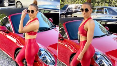 Christmas 2019: Jennifer Lopez Looks Stunning in a Red Latex Sportswear Posing Alongside Red Porsche (View Pics)