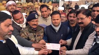 Anti-CAA Protests: Muslim Community Gives Cheque of Over Rs 6 Lakh to UP Government As Compensation For Damages During Demonstrations (Watch Video)