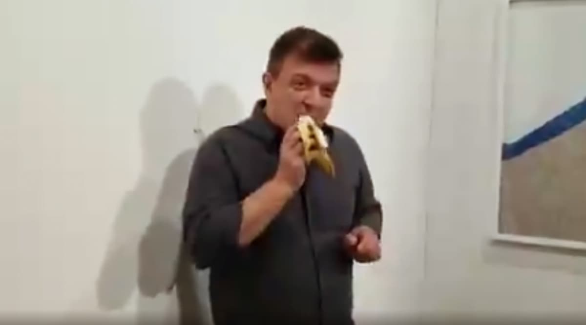 Man Eats $120,000 Banana From Art Basel Exhibit in Miami; Watch Video Man Eats $120,000 Banana From Art Basel Exhibit in Miami; Watch Video