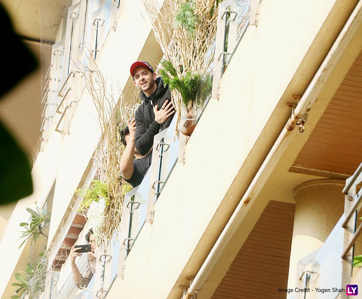 Hrithik Roshan greets fans at his residence.