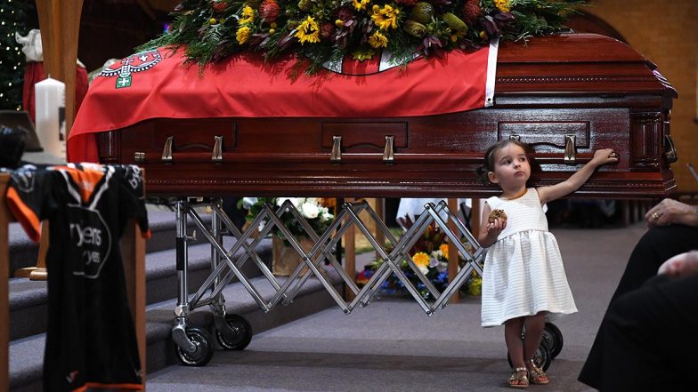 Australia Bushfires: Late Firefighter’s Daughter Innocently Plays Beside His Coffin, These Funeral Pictures Will Break Your Heart