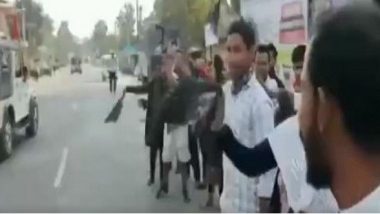 Assam CM Sarbananda Sonowal Shown Black Flags by Anti-CAA Protesters (Watch Video)