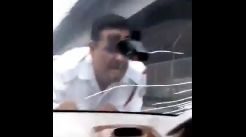 Delhi Man Drags Traffic Police Personnel On Cars Bonnet For Two Kilometers Video Goes Viral 7491