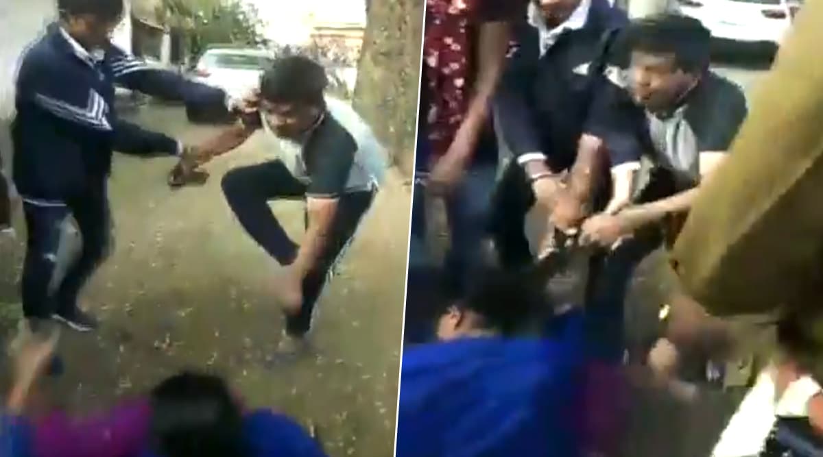 Madhya Pradesh: Gandhwani Police Station Incharge Beats Up Wife After After She Catches Him Having an Illicit Affair; Watch Video Madhya Pradesh: Gandhwani Police Station Incharge Beats Up Wife After After She Catches Him Having an Illicit Affair; Watch Video