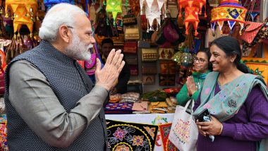 PM Narendra Modi's Visit to Hunar Haat: Prime Minister Interacts With Craftsmen, Plays Musical Instruments (Watch Video)