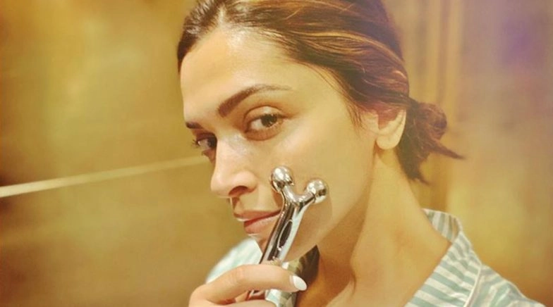Deepika Padukone Strikes a Pose with Her Face Roller Showcasing Her Productivity During COVID-19