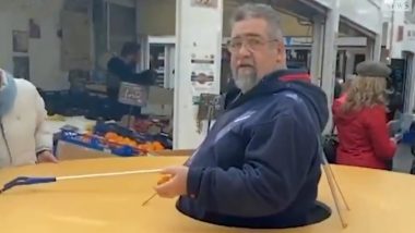 Coronavirus Scare: Italian Man Takes Social Distancing to Another Level by Wearing Giant Disk-Shape Cardboard Around His Waist (Watch Video)